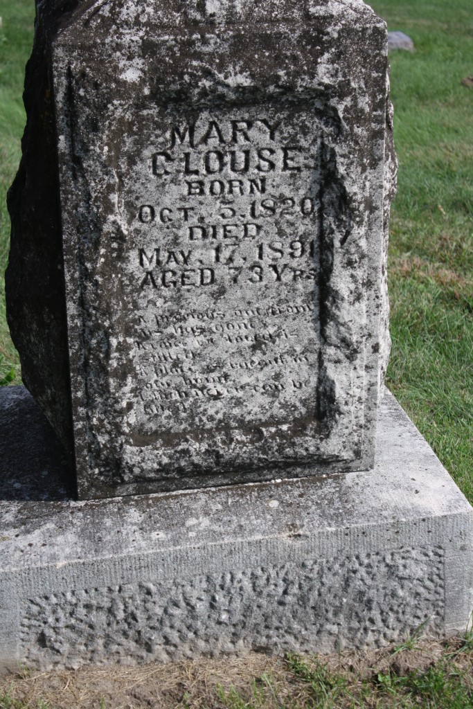 I'm not sure which is the front and which is the back. But on one side we find the inscription. on the other side is a box to put in decoration? Or memorials? Or...what?
